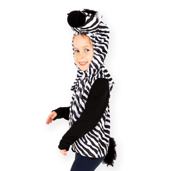 Side profile of child wearing a zebra themed costume top. the hood and waist are elasticated and the striped black and white plush material looks comfortable.