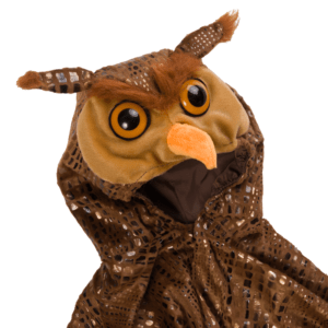 Close up product image of owl cape hood, showcasing soft plush owl face detailing including orange beak, tuffty ears and two-tone reflective eyes